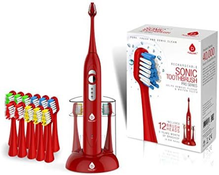 Red rechargeable sonic toothbrush with travel features
