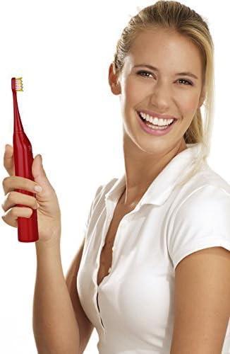 Red rechargeable sonic toothbrush with travel features — photo 4