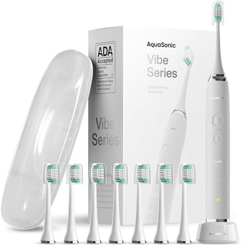 Optic white vibe toothbrush with eight brush heads