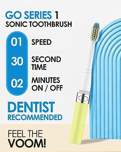 Yellow battery powered sonic travel toothbrush — photo 4