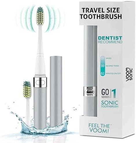 Silver sonic toothbrush with smart timer