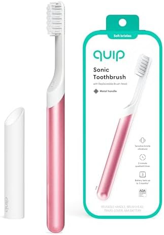 Pink metal sonic travel toothbrush