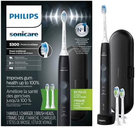 Black rechargeable toothbrush with three heads