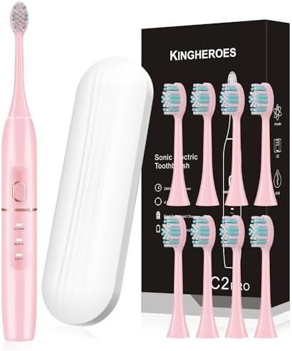 Pink sonic toothbrush with eight replacement heads
