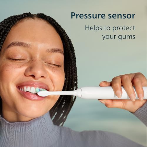 Deep pink 4100 series rechargeable toothbrush — photo 5