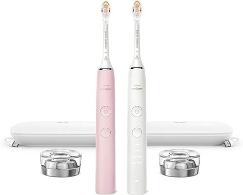 Rechargeable toothbrush pair in pink and white