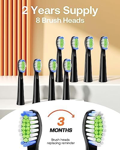 Black sonic toothbrush with eight brush heads — photo 4