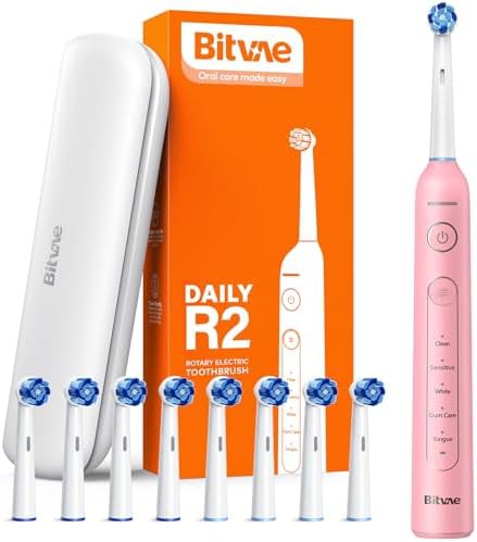 Rotating toothbrush with pressure sensor and heads