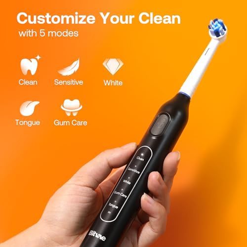 Black rotating toothbrush with smart timer — photo 3