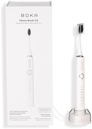 Rechargeable sonic brush with charcoal bristles