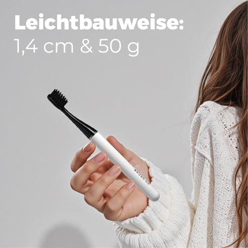 White slim rechargeable sonic toothbrush — photo 3