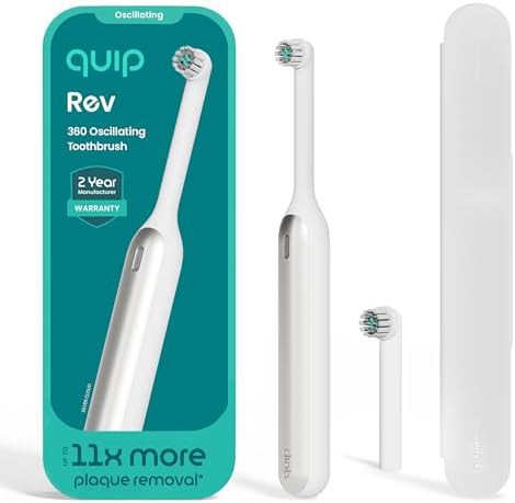 Silver oscillating travel toothbrush with mirror mount