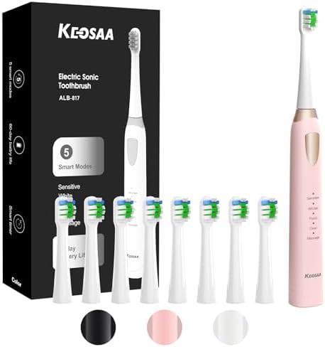 Pink sonic toothbrush with eight replacement heads