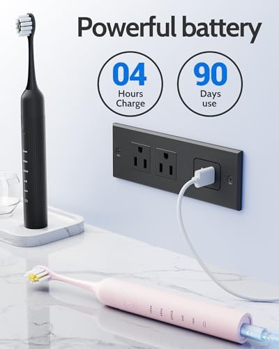 Black and pink sonic toothbrush pair — photo 4