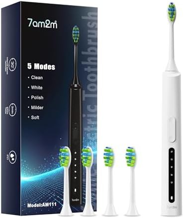 White sonic toothbrush with four brush heads