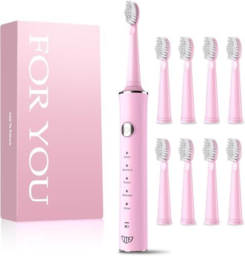 Portable sonic brush with eight replacement heads