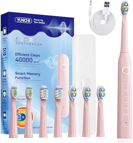 Pink rechargeable sonic toothbrush for adults