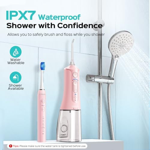 Pink electric toothbrush and water flosser kit — photo 5