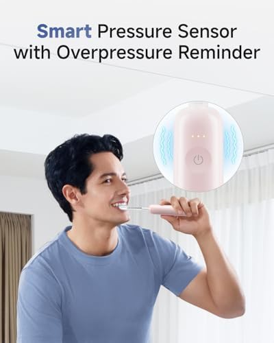 Pink ABS oscillating toothbrush with pressure sensor — photo 4